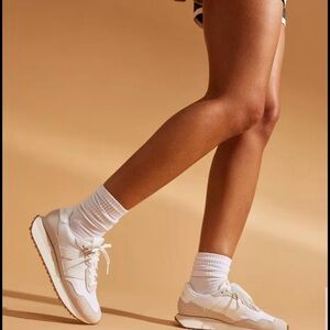 New Balance 237 trainers in beige and oatmeal